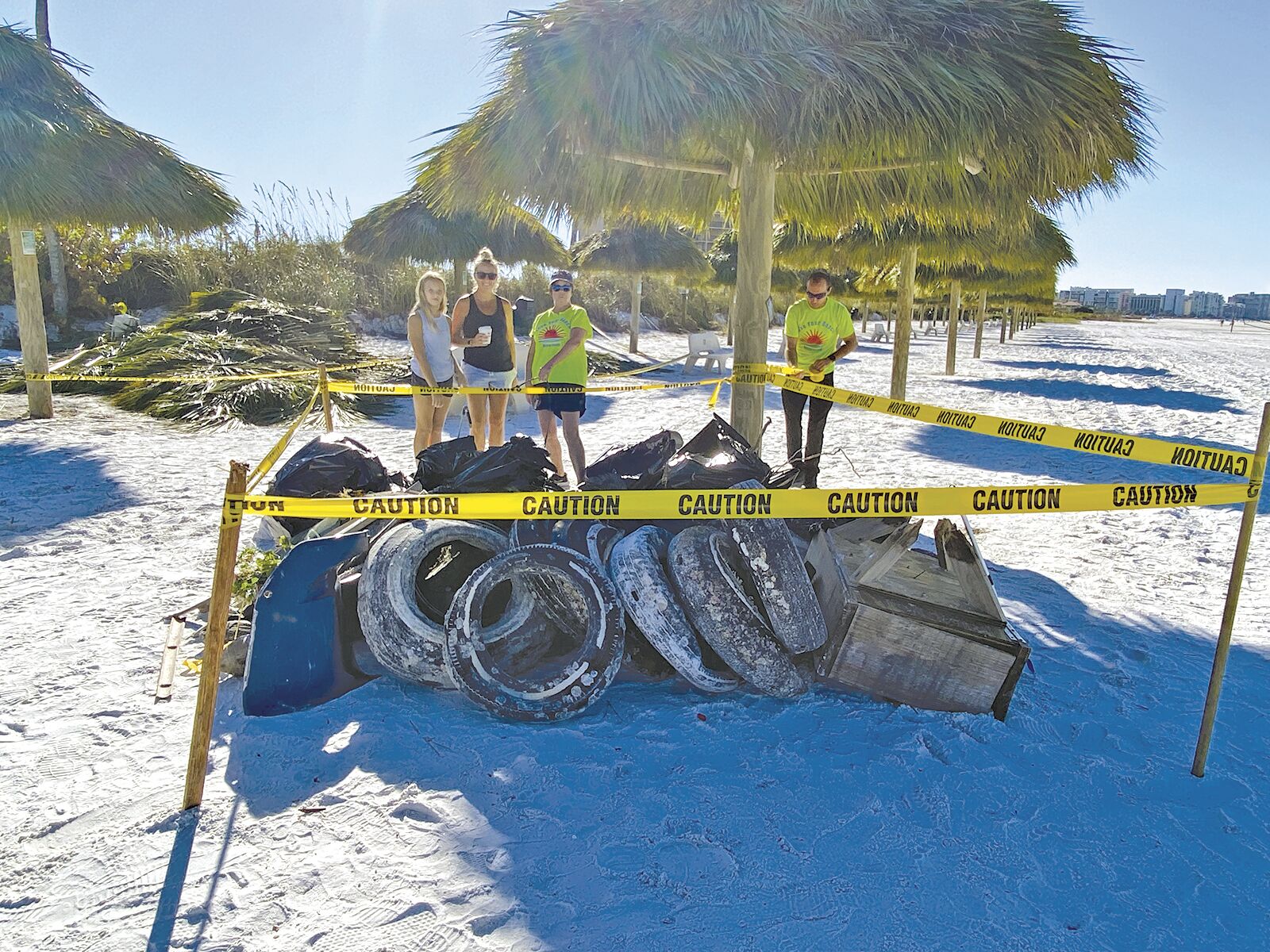 2. John Lafakis of Marco’s Public Works tapes off the area.tif